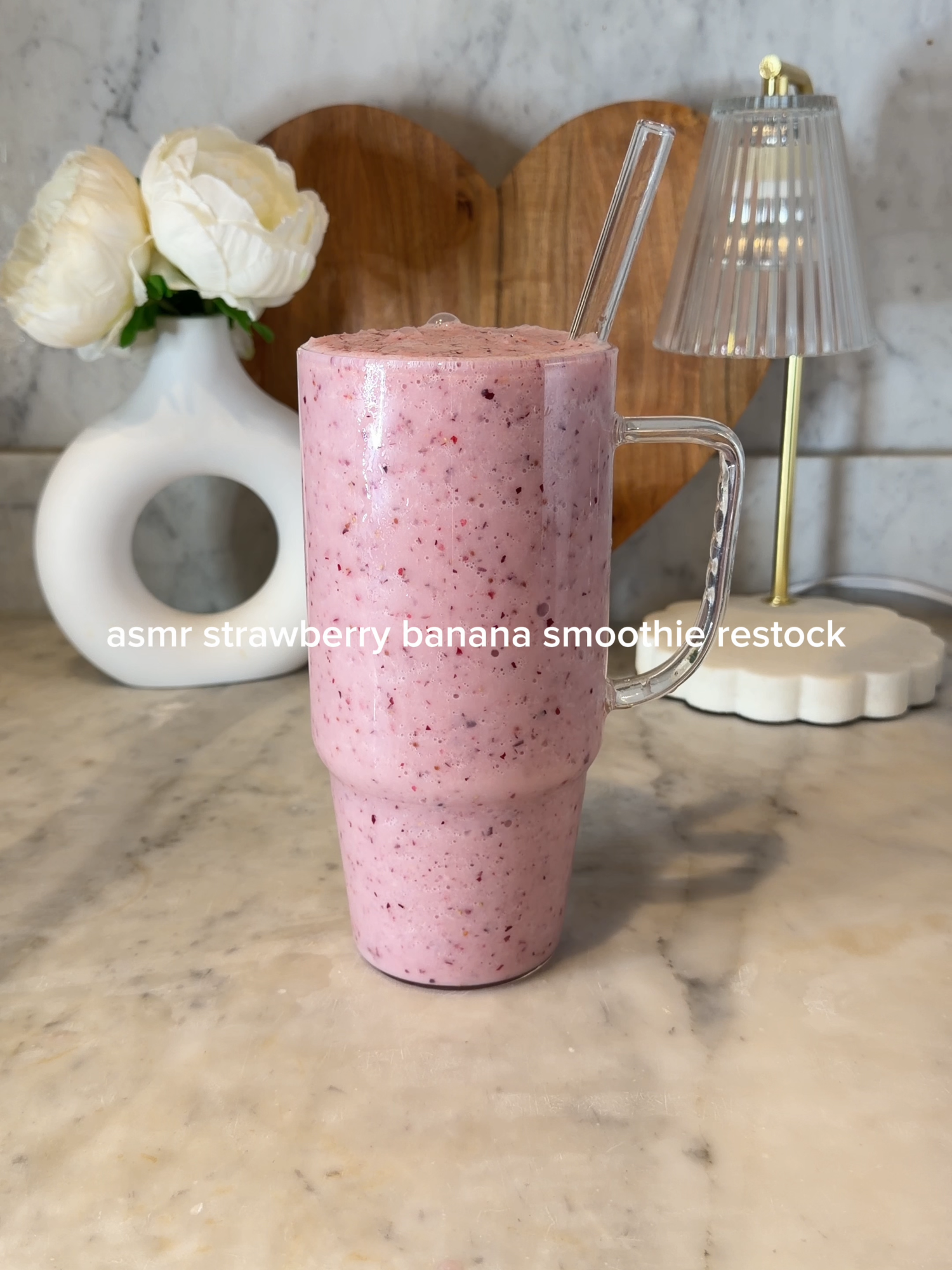 TikTok post by @galicia_gordon for Ninja Kitchen. Caption reads: asmr strawberry banana smoothie restock #ASMR....