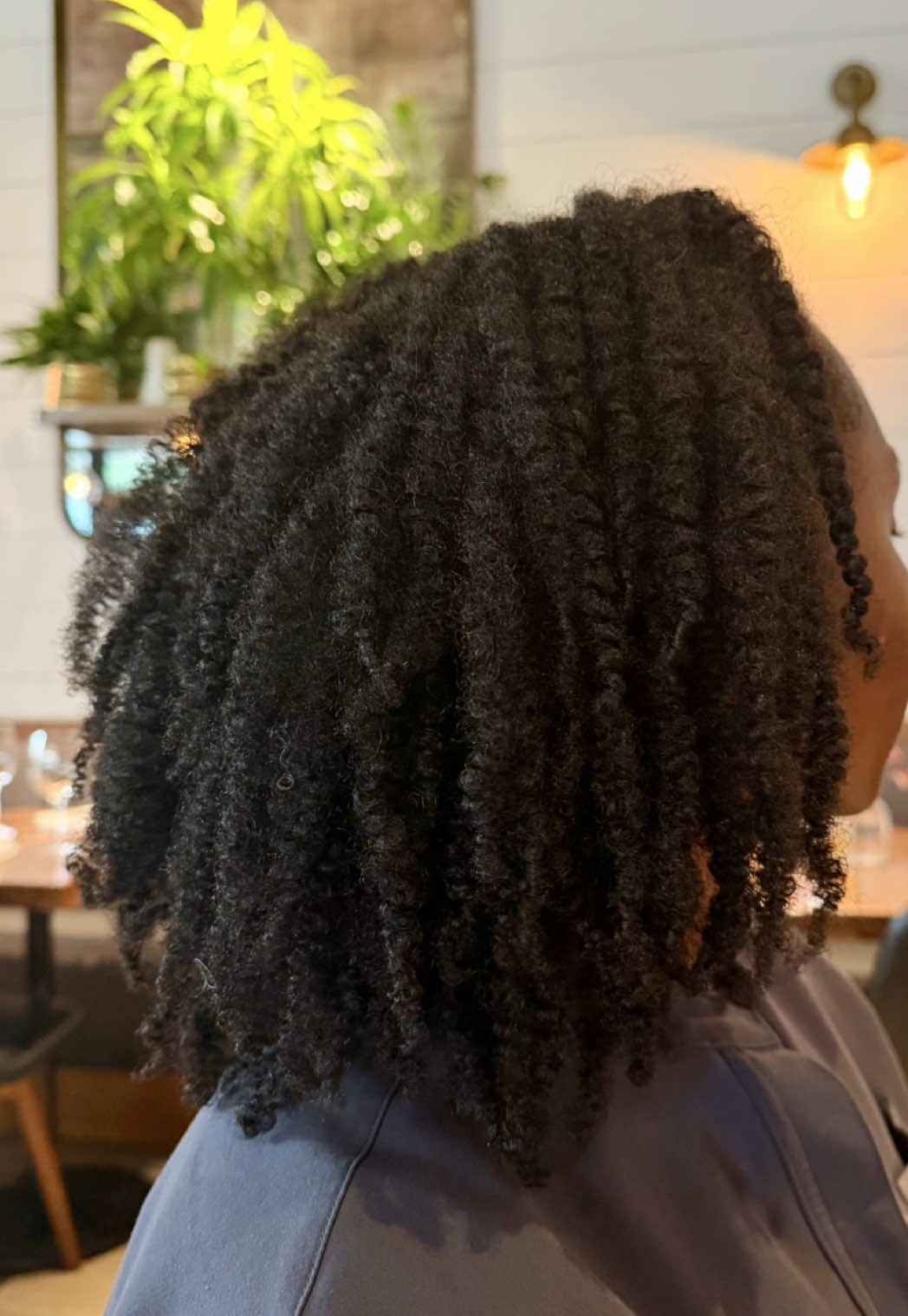TikTok post by @naturalainee for ECO Style. Caption reads: [...] a twist out and I'D DO IT AGAIN 😭🫶🏾 @Eco....