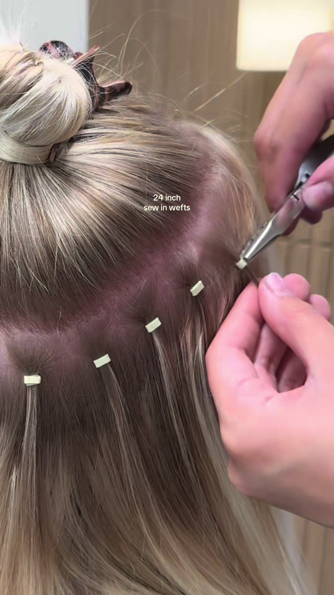 TikTok post by @hairby.stephmarie for Insert Name Here. Caption reads: installing 2 packs of genius wefts for this long....