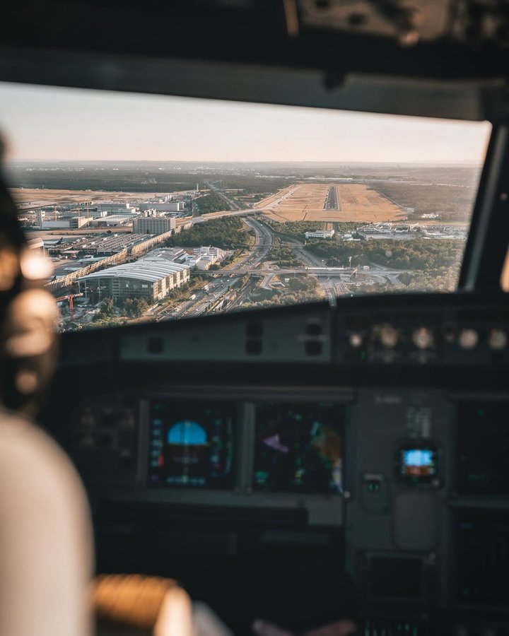 Instagram post by @pilotstories for Nikon DACH. Caption reads: Coming home - approaching runway 25R at Frankfurt....