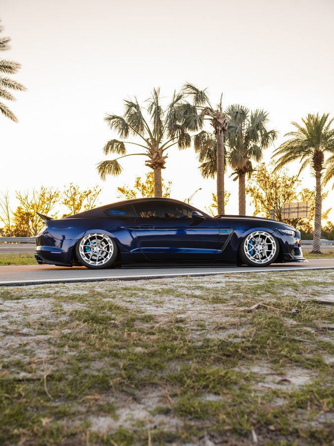 Instagram post by @ollies_s550 for Street Aero. Caption reads: Not sure what looks better sunset or night time....