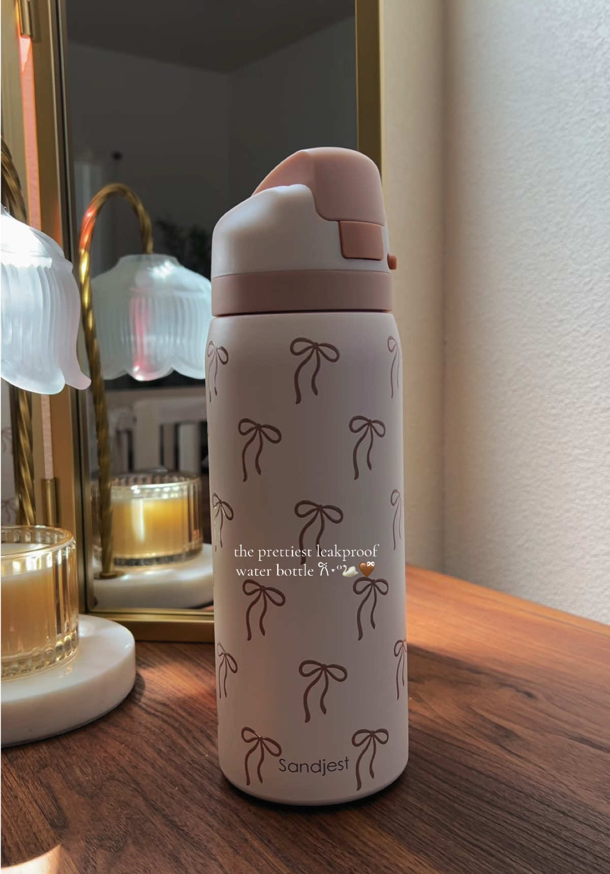 TikTok post by @maiaglowss for Sandjest. Caption reads: [...] a lockable lid & is SO PRETTY 🤎ྀིྀི....