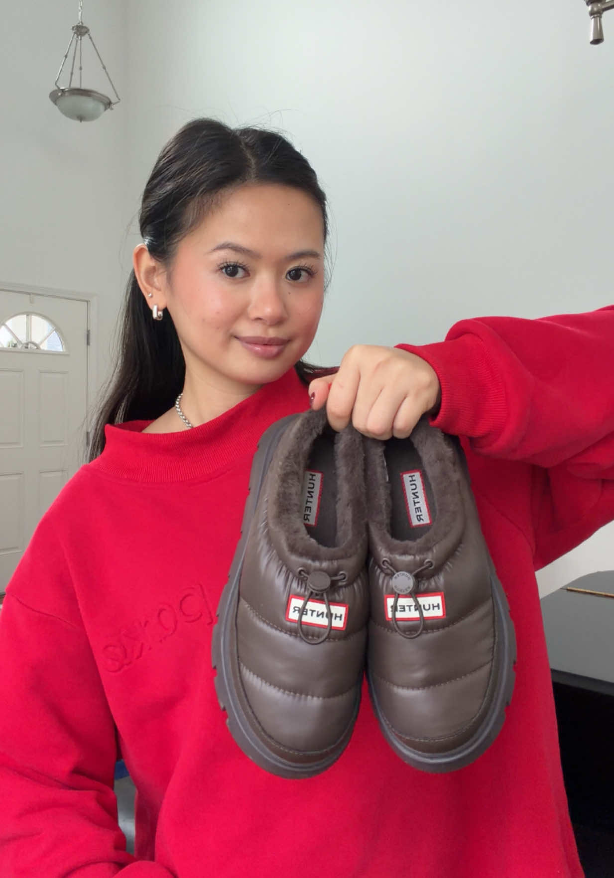 TikTok post by @shayfl for Hunter Boots. Caption reads: my review of the @Hunter Boots Madi Slip ons - psa....