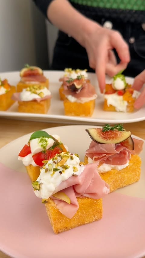 Instagram post by @kitchenchapters for Kerrygold. Caption reads: [...] Crispy stacked polenta bites with Kerrygold....