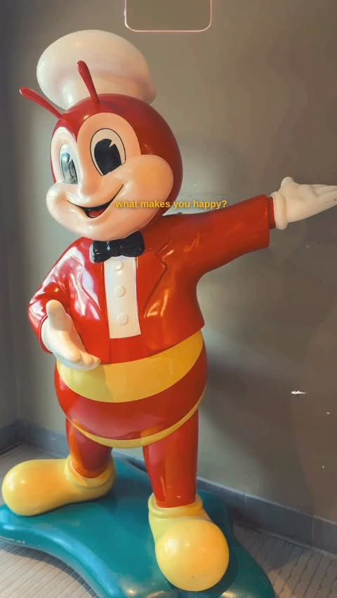 Instagram post by @houston_trending_feed for Jollibee US. Caption reads: 🍔🔥 This makes me SO happy. #ad @jollibeeus....