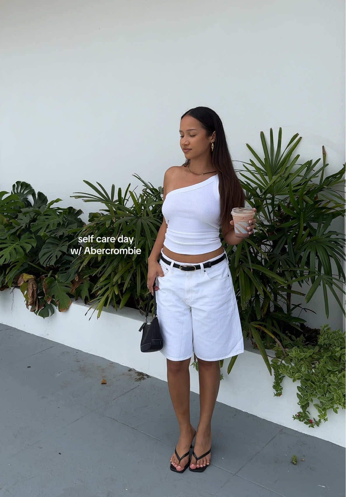 TikTok post by @geminivlogss for Abercrombie & Fitch. Caption reads: #AbercrombiePartner serving looks & self love ⭐️....