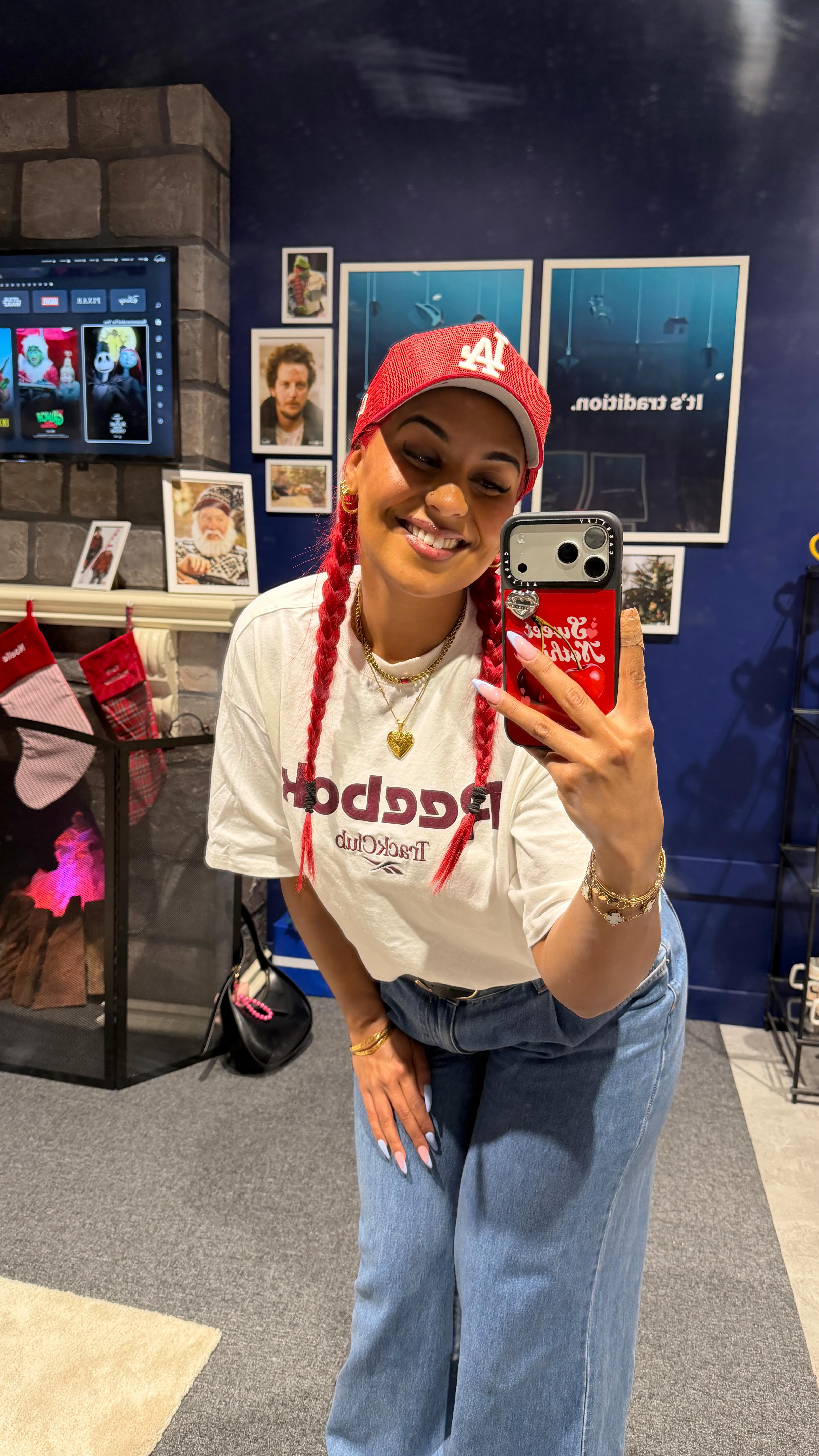 Instagram post by @jasminetxo for Disney Store. Caption reads: [...] walk to Westfield Southland’s new....