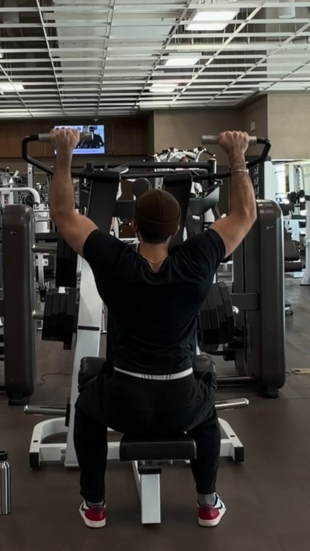 Instagram post by @m_zee0 for Life Time. Caption reads: Wanna make your back pop out like a demon’s back?....