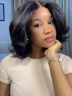 TikTok post by @preciousidika_ for Nadula. Caption reads: Loving this Bob from @NadulaHair 😍😍 Hair....