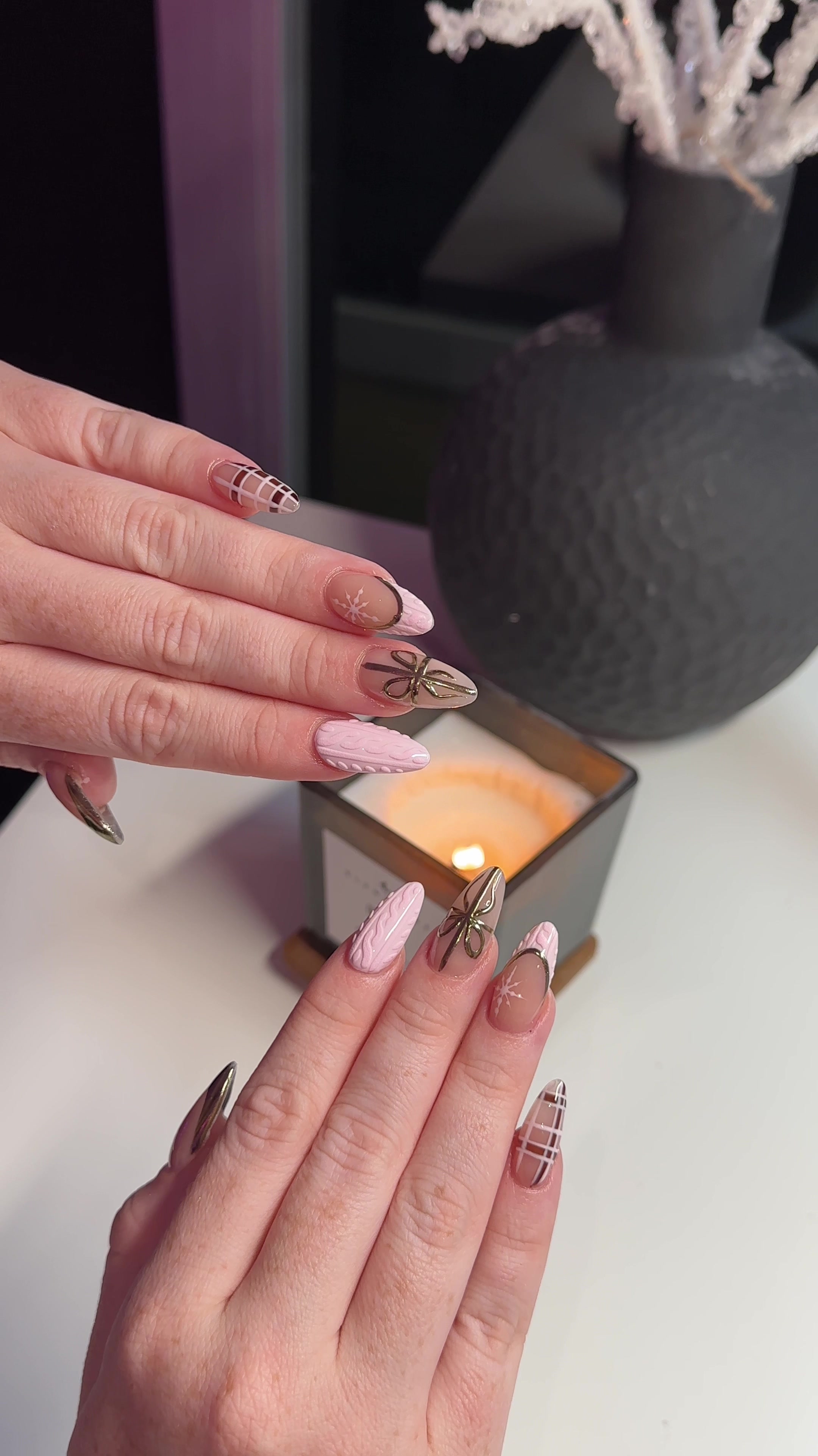 TikTok post by @nails.nela for MelodySusie. Caption reads: pink winter nails using @melodysusie new INSANE....