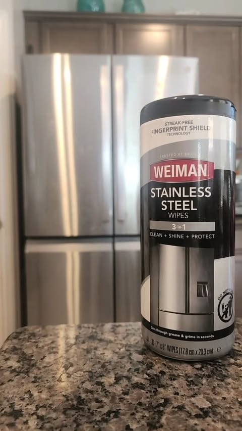 Instagram post by @aleclaudiaglam for Weiman Products. Caption reads: @weimanproducts Stainless Steel Wipes will get all....