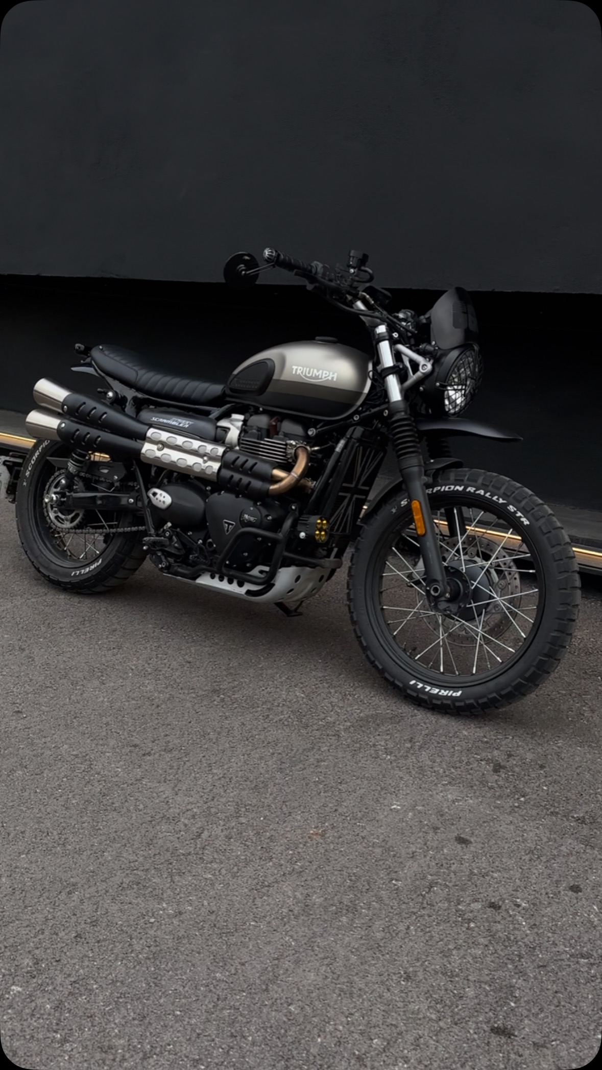 Instagram post by @ms_scrambler for Motone. Caption reads: TRIUMPH STREET SCRAMBLER 900 SANDSTORM EDITION BY....