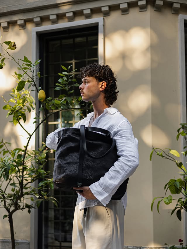 Instagram post by @felix.ruess for Zalando. Caption reads: [...] the essentials this summer @allsaints....