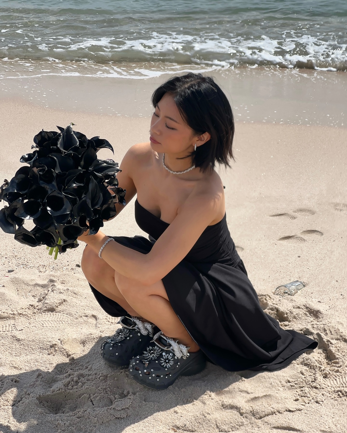 Instagram post by @tingting_lai for SWAROVSKI. Caption reads: a day in cannes with @swarovski x @crocsgermany....