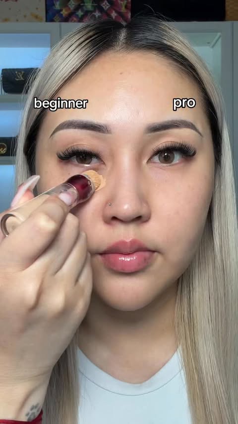 Instagram post by @laurabuix for Axis-y. Caption reads: Using @axisy_official Vegan Collagen Eye Cream to....