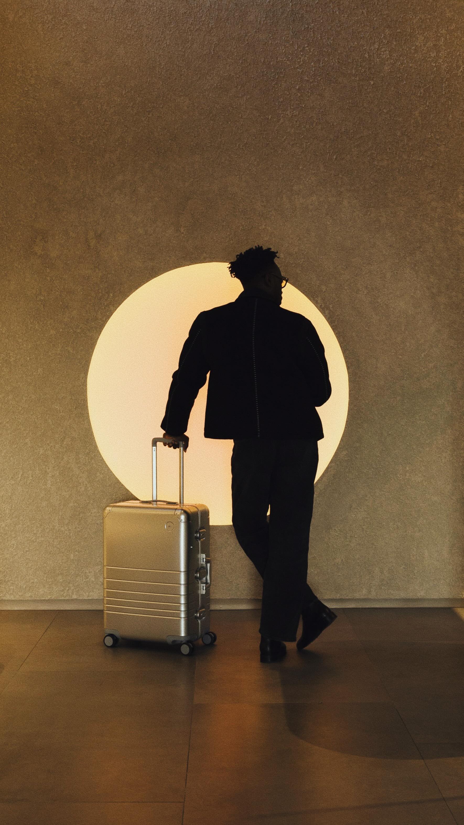 Instagram post by @thecreativegentleman for Monos. Caption reads: @monostravel just landed in Georgetown and I’m....