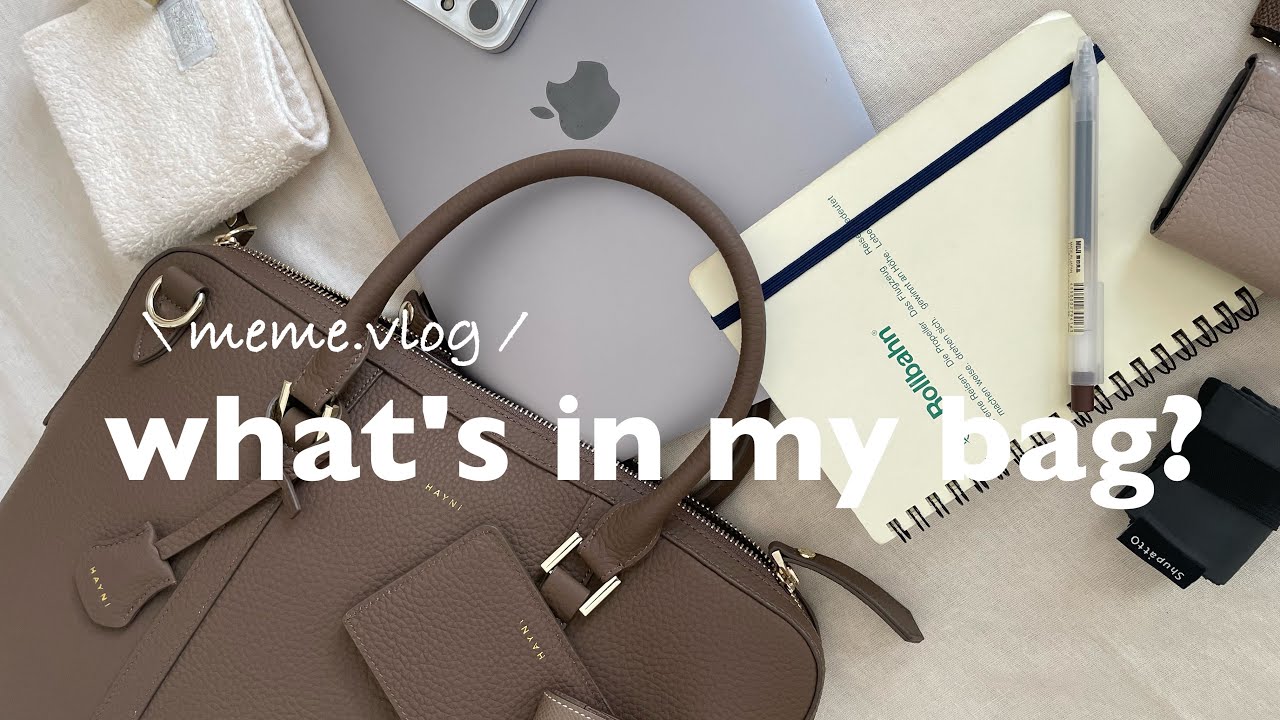 YouTube post by @memevlog for HAYNI. Caption reads: 〔what's in my bag?〕Introducing the contents of a....