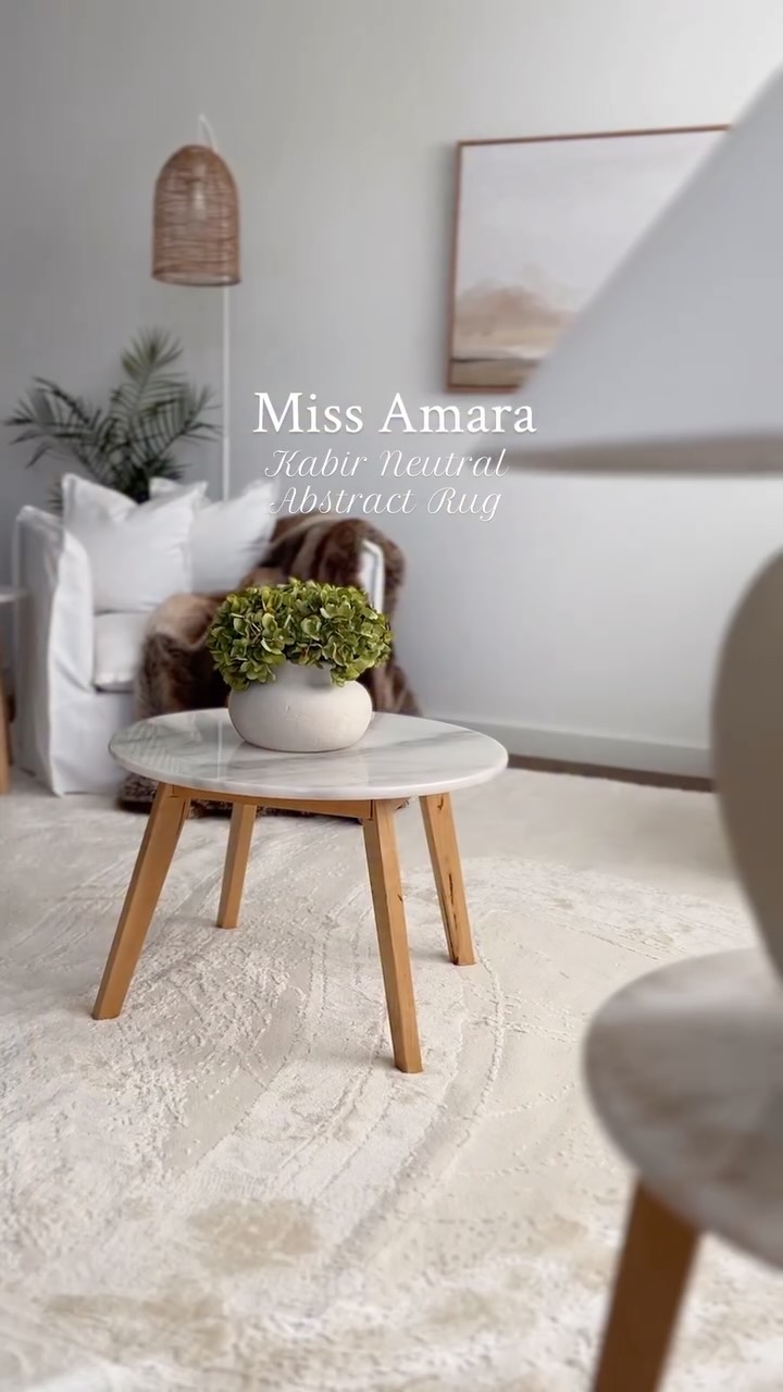 Instagram post by @homey_haven_by_aymah for Miss Amara. Caption reads: [...] Kabir Neutral Abstract Rug from....