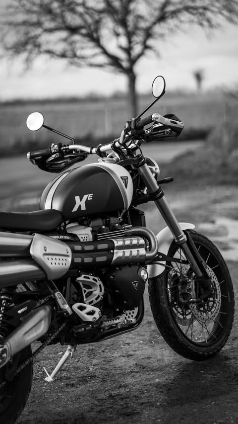 Instagram post by @thebritishmotorbiker for Triumph Motorcycles. Caption reads: [...] features? #triumphscrambler....