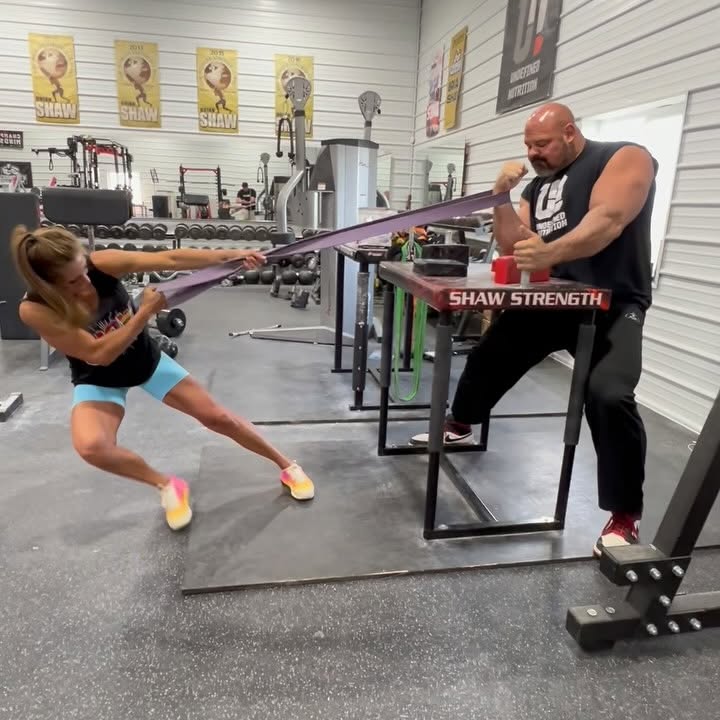 Instagram post by @shawstrength for TRIFECTA. Caption reads: PARTNER WORKOUT 💪❤️

My beautiful and strong wife....