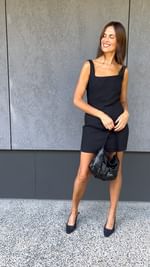 Instagram post by @abigailoneill for St. Agni. Caption reads: [...] Wearing nothing but consciously created....