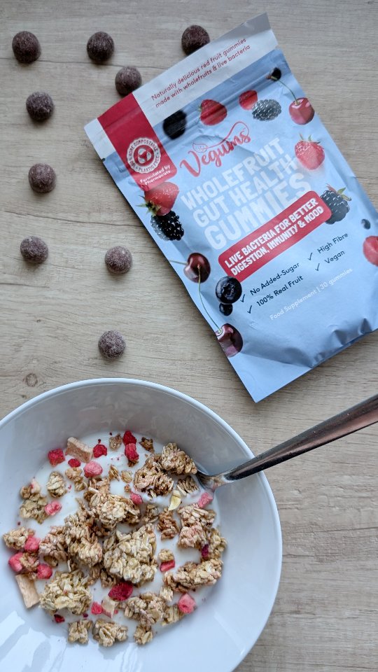 Instagram post by @adventuresofbobbinandbunny for Vegums. Caption reads: VEGUMS PROBIOTIC 🍓 (ad|gifted) I'm working hard....