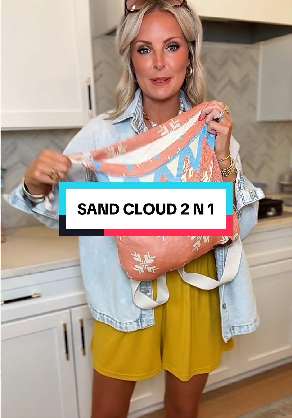 TikTok post by @leahkatm22 for Sand Cloud. Caption reads: @Sand Cloud #sandcloud #sandcloud2n1towelbag [...].