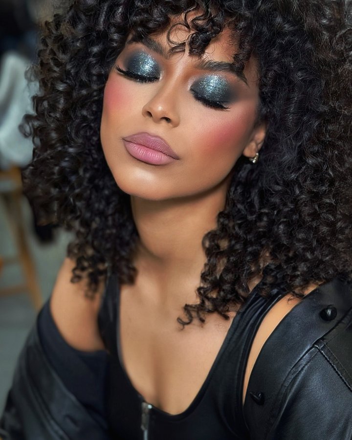 Instagram post by @kateryna_keleberda for Black Radiance Beauty. Caption reads: Back to LAFW @artheartsfashion 🩷 my beautiful....