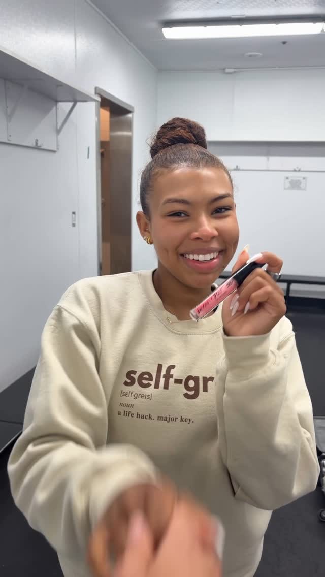 Instagram post by @starrandrews for Black Radiance Beauty. Caption reads: Wearing @blackradiancebeauty like it should be....