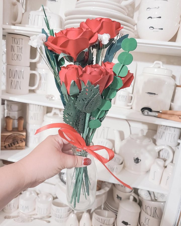 Instagram post by @jcuccionilli for Lovepop. Caption reads: [...] card or handcrafted paper flowers from....