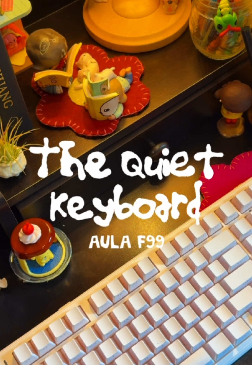 TikTok post by @littlebugdiary for Aula. Caption reads: AULA F99 is the perfect quiet keyboard!⭐️🌷 [...].