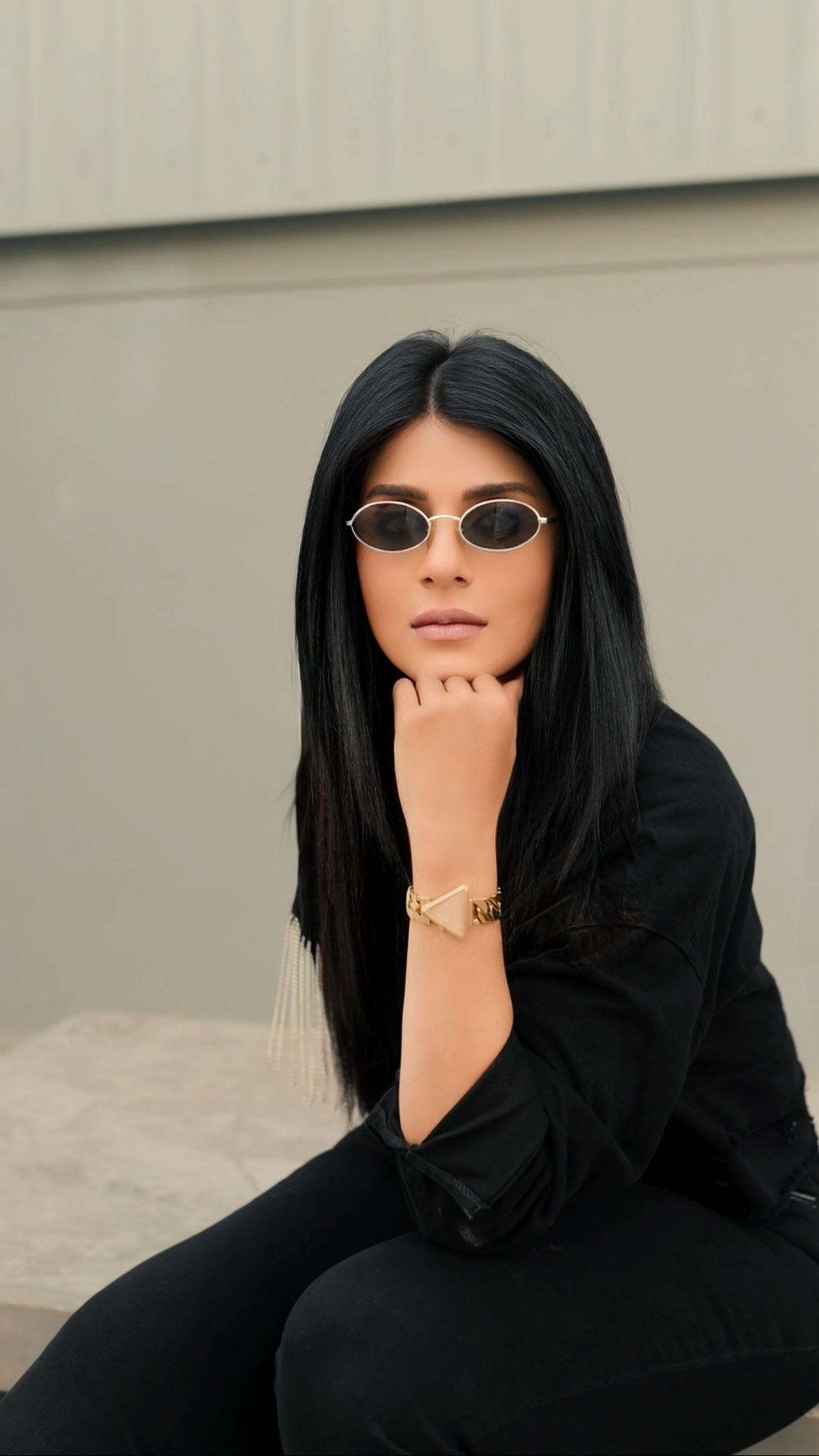 Instagram post by @zinobia.mistry for GUESS Watches. Caption reads: Strutting around the city in style - this gold....