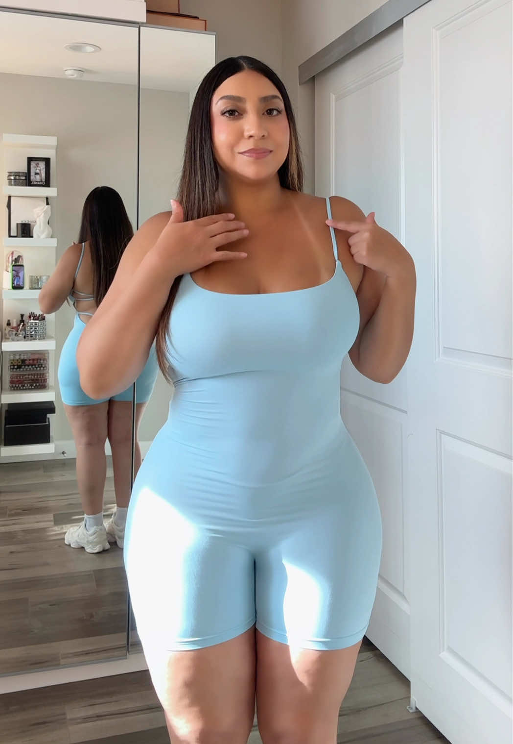 TikTok post by @realnancyhernandez for OQQ. Caption reads: The romper you need for hot days ☀️🩵 @OQQfitness....