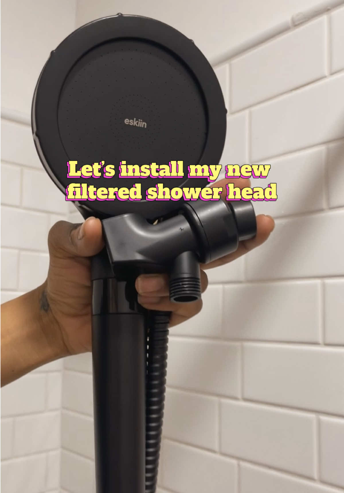TikTok post by @everything_bylaneise for Eskiin. Caption reads: Love my filtered shower head @eskiin.