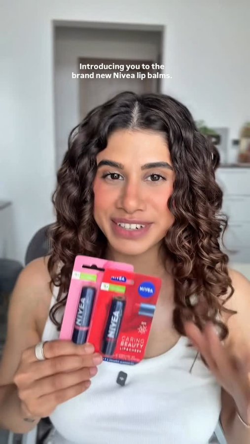 Instagram post by @malvikasitlaniofficial for NIVEA India. Caption reads: #AD The new @niveaIndia Tinted Lip Balms are....