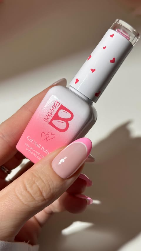 Instagram post by @gemmapope_nailartist for BeetlesGelPolish. Caption reads: #Ad V-Day heart nails....