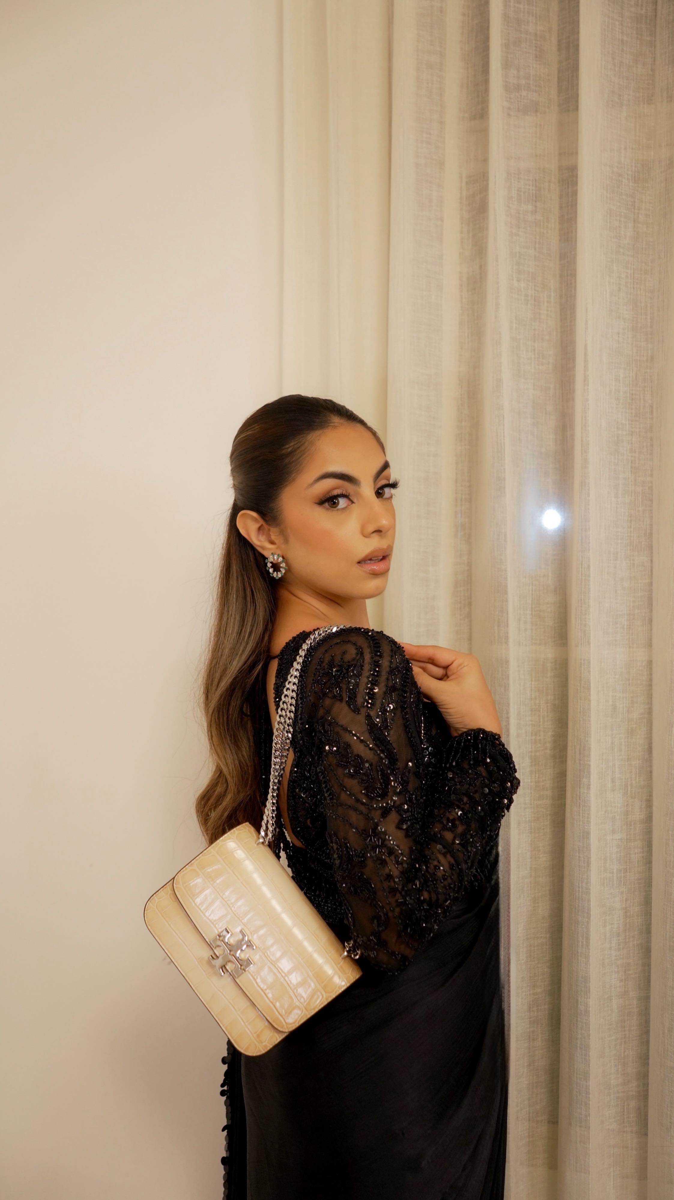 Instagram post by @ravkirat_ for AJIO. Caption reads: A dash of sparkle this festive season ✨

The....