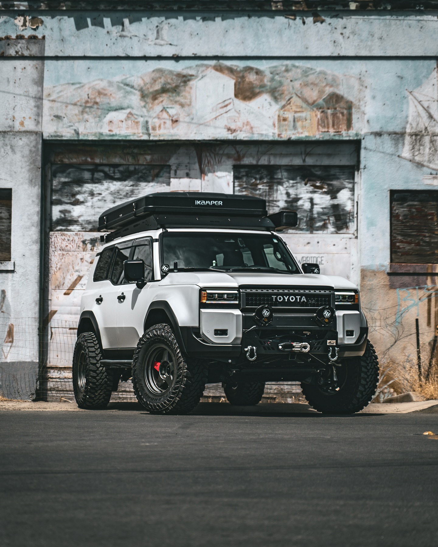 Instagram post by @catunedoffroad for Toyota USA. Caption reads: Wishing everyone a happy and safe Independence Day....