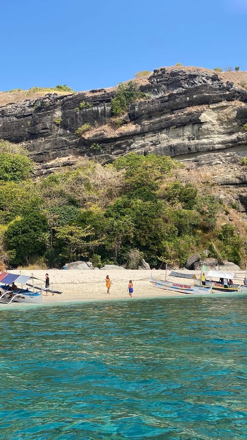 Instagram post by @figueroakevinn for ShopBack. Caption reads: It’s your sign to travel 🏖️

#ShopBackForTheWins....