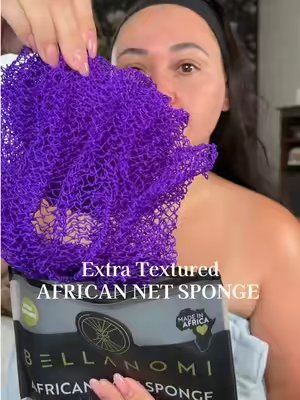 TikTok post by @dailyglowwithdes for Bellanomi. Caption reads: The new @Bellanomi AFRICAN NET SPONGE with extra....