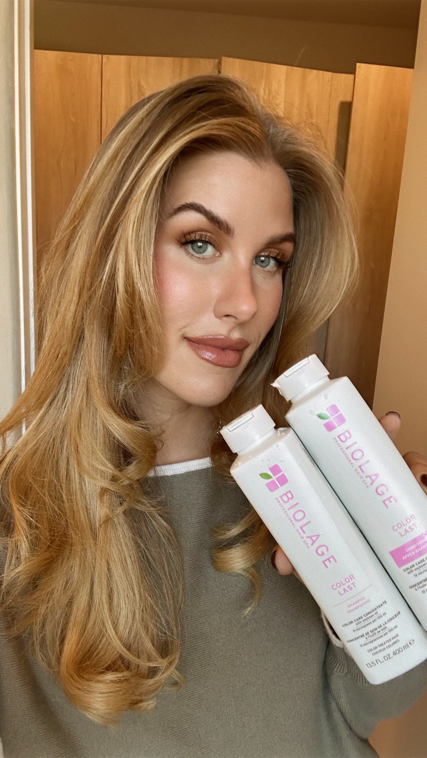 Instagram post by @ashley.paiige for Biolage. Caption reads: seasonal swaps are fun but my @biolage Color Last....