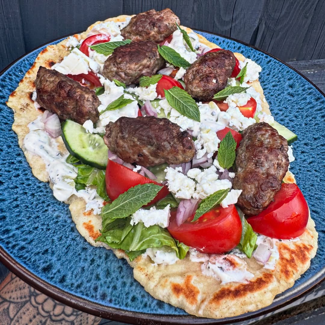 Instagram post by @sarah_cc_recipes for Jd Seasonings. Caption reads: Homemade flatbread topped with tzatziki, salad &....