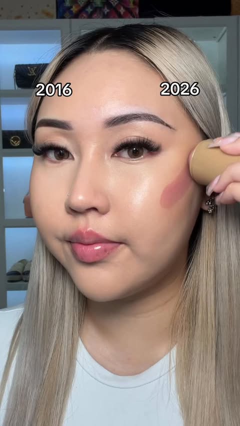 Instagram post by @laurabuix for Axis-y. Caption reads: My 2016 vs 2026 makeup routine! I’m using....