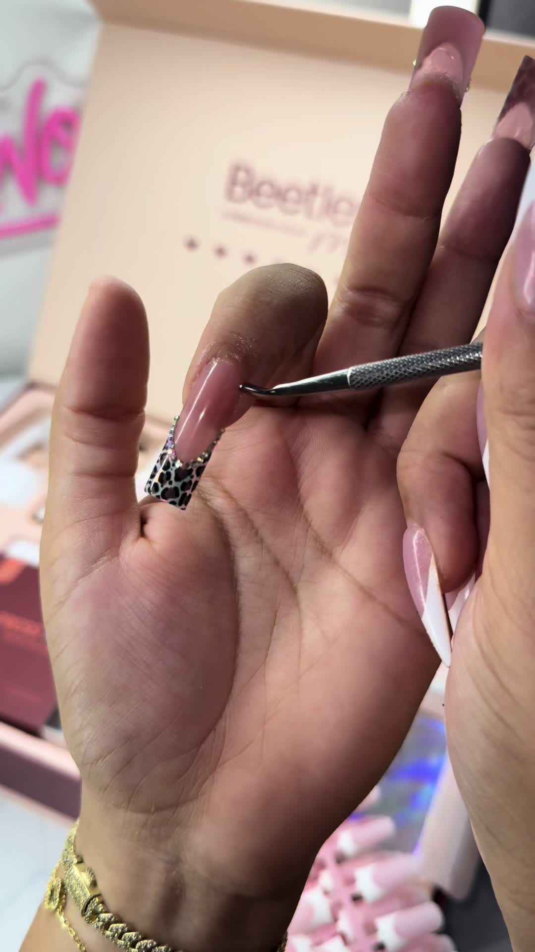 TikTok post by @nailz_by_ashleyyy for BeetlesGelPolish. Caption reads: [...] my nails off again @BeetlesGelPolish....