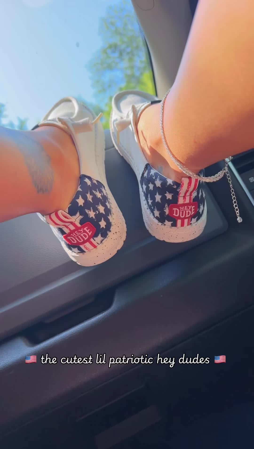 TikTok post by @itzkaitlynbee for Hey Dude Shoes. Caption reads: [...] dudes 🧨😍🇺🇸 @HeyDude #heydudes....