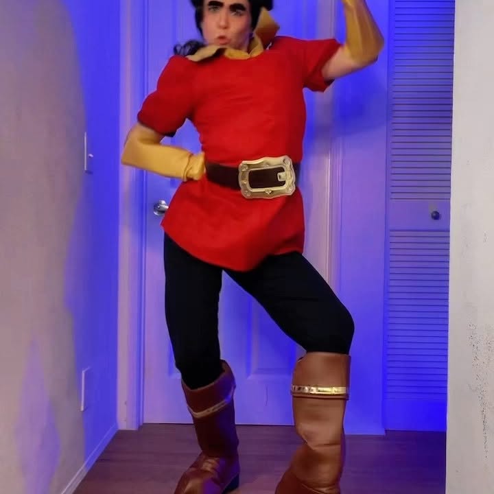 Instagram post by @sabrinamaecosplay for FUN.com. Caption reads: ✨Whoa✨SLOW DOWN MAURICE😏💪🏻
.
.
Gaston cosplay....