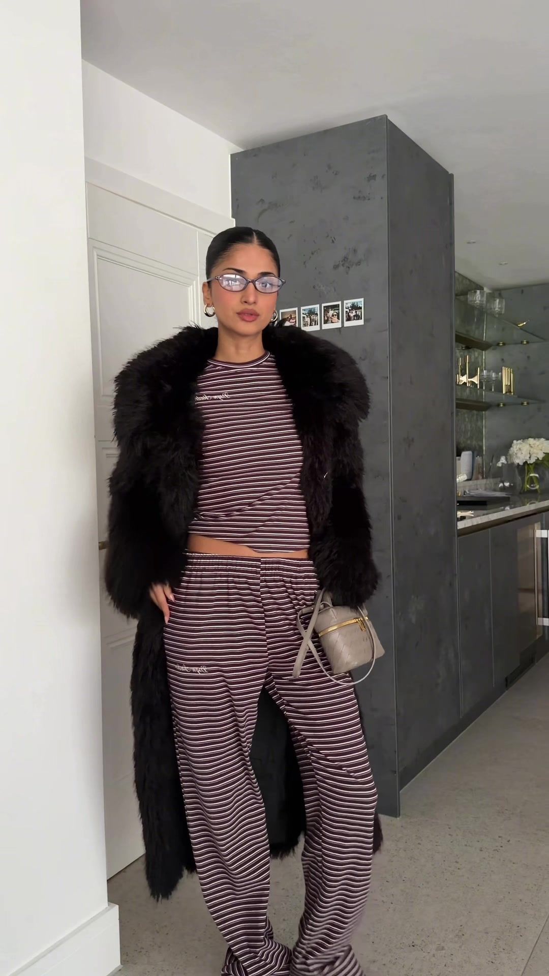 TikTok post by @kimmmann_ for Boohoo. Caption reads: the coat thooo😍 full fit is @boohoo use code:....