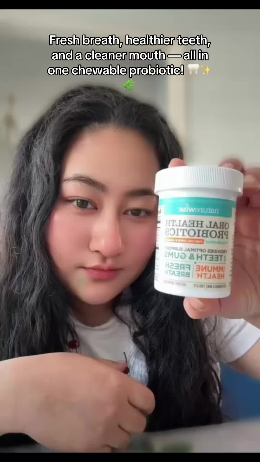 TikTok post by @rina_ghalley for NatureWise. Caption reads: [...] #dentalhygiene #probiotics @NatureWise....