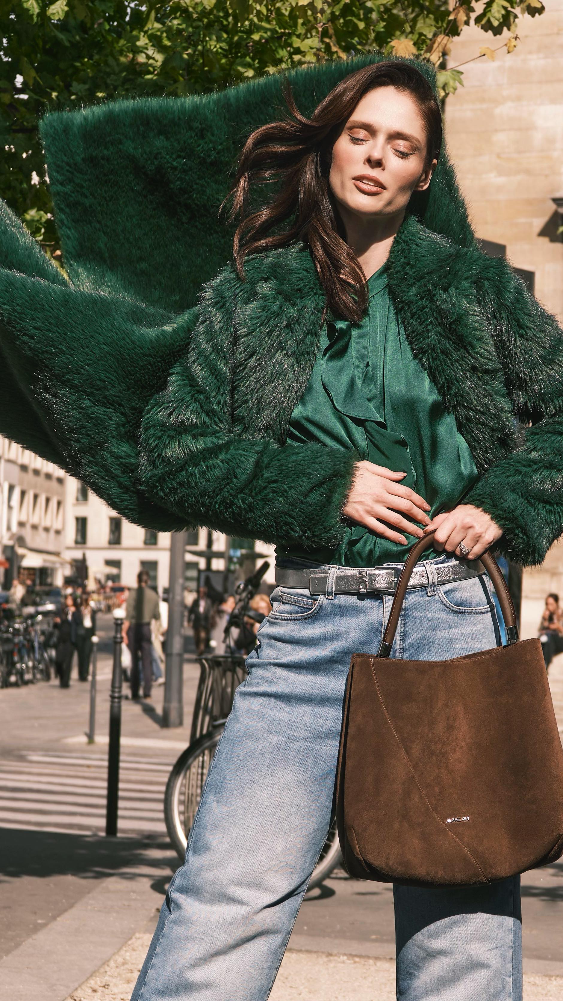 Instagram post by @cocorocha for Marc Cain. Caption reads: Cozy, chic and ready for autumn in @marccain 🍂 🍁.