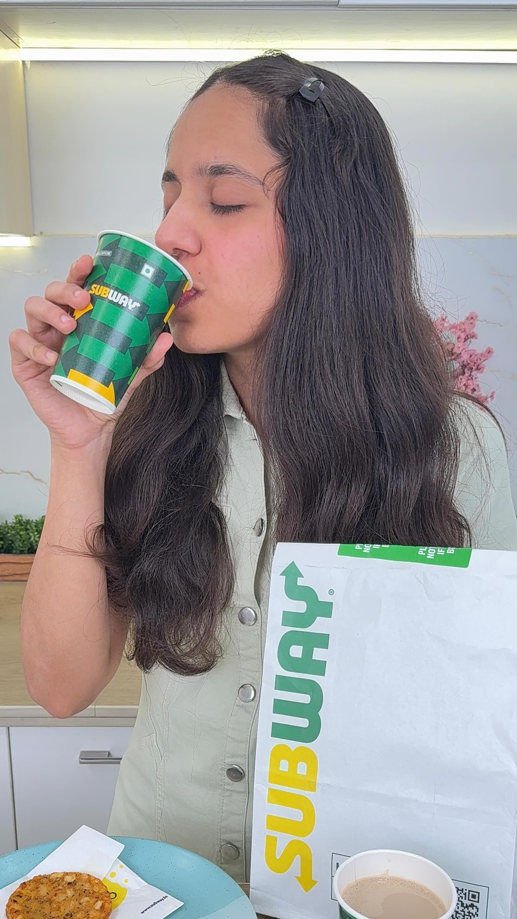 Instagram post by @anjali_dhingra18 for Subway. Caption reads: Team ordering in 🛋️ or stepping out for....